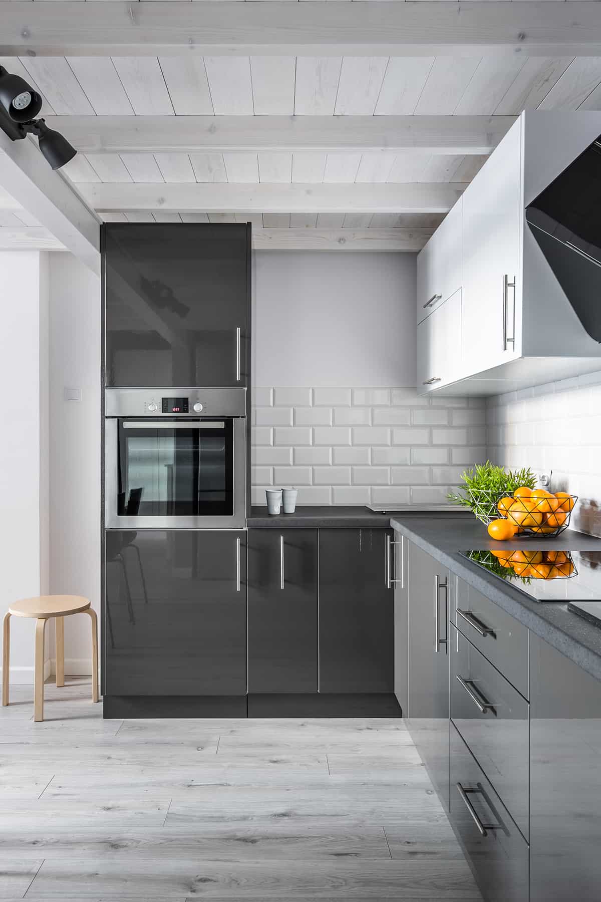 Gray kitchen cabinets and gray floors