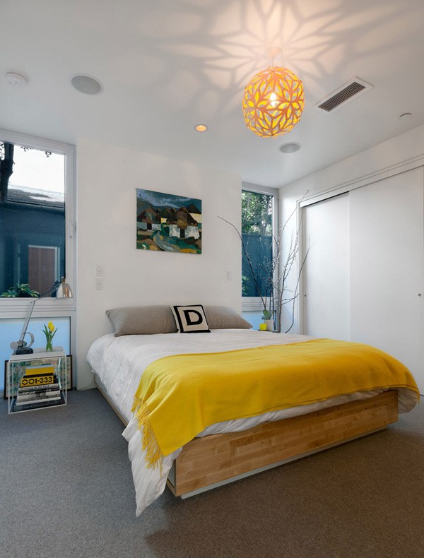 Yellow accents to bedroom