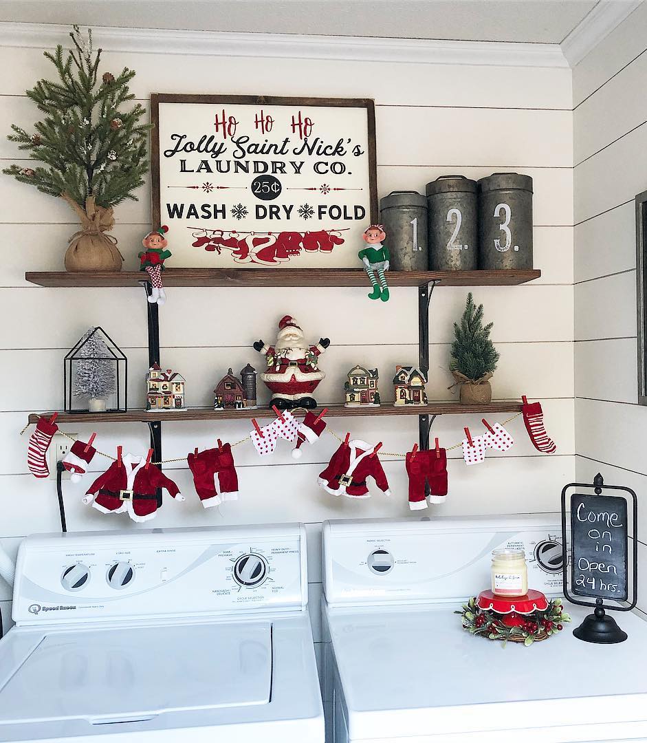 Christmas Laundry Room Decor Santa Suit Hanging to Dry with Clothespins via @mycarolinafarmhouse